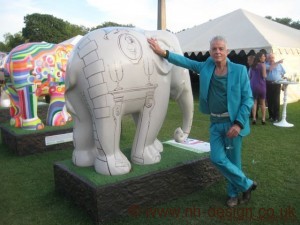 Nicky Haslam with his Elephant Parade creation, titled Less is Morvi